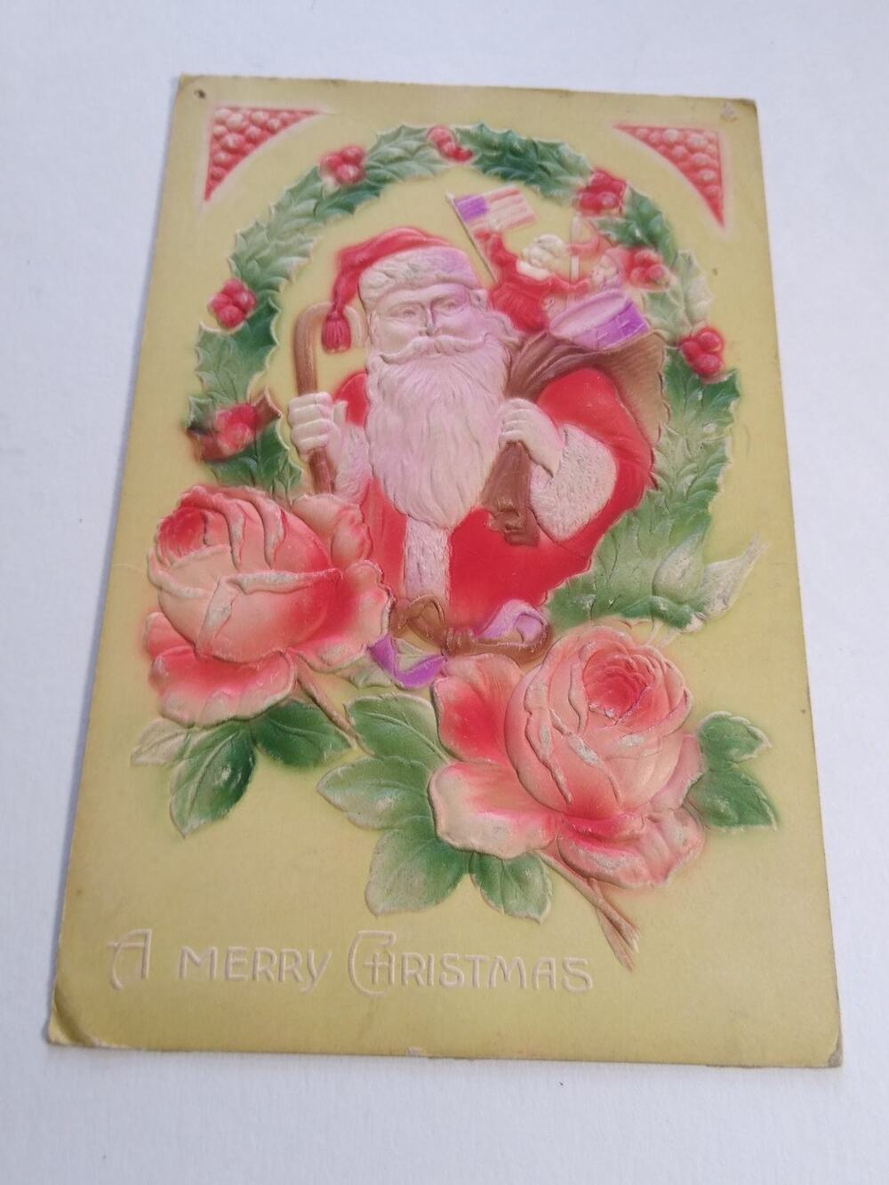 Vintage Embossed Santa Claus Christmas Postcard Child & Flag, Roses Airbrushed